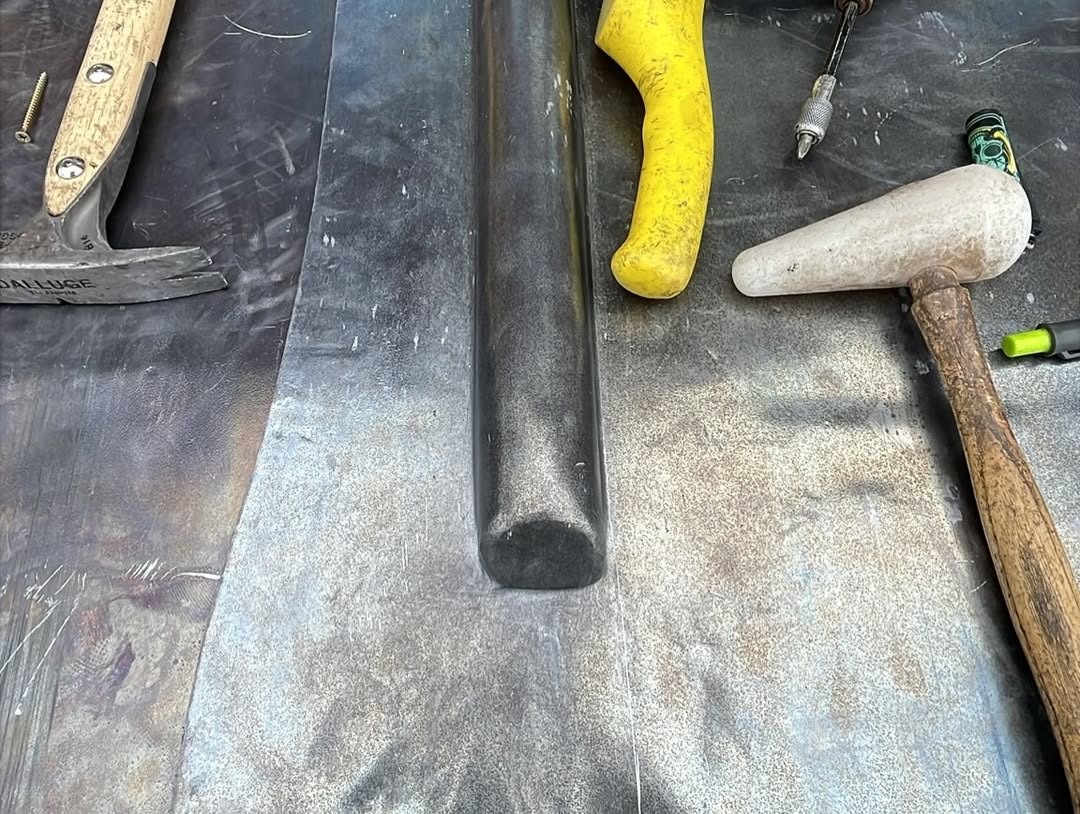 Traditional leadworking tools on a lead sheet